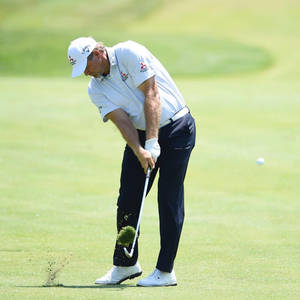 Retief Goosen Taking A Divot Wallpaper