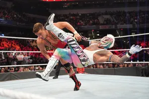 Rey Mysterio In Action Wrestling Match Wallpaper