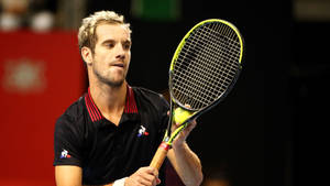 Richard Gasquet In Action, Ready To Serve In A Match Wallpaper