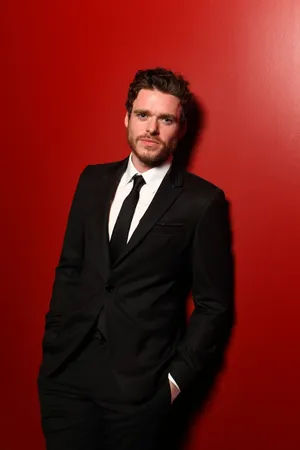Richard Madden In Black Suit Wallpaper
