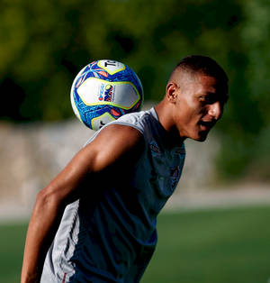 Richarlison De Andrade With A Ball On Back Wallpaper