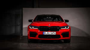 Richly Detailed Bmw M5 4k Car Parked In The City Centre. Wallpaper