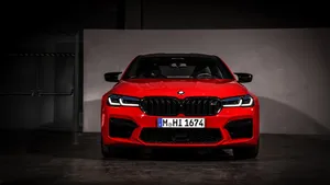 Richly Detailed Bmw M5 4k Car Parked In The City Centre. Wallpaper