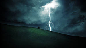 Rider In Thunderstorm Wallpaper