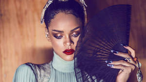 Rihanna Hd Holding Fan Wallpaper