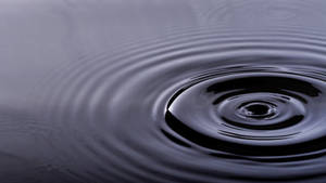 Rippling Gloomy Waters Wallpaper