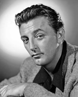 Robert Mitchum Black And White Eyebrow Raise Wallpaper