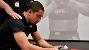 Robert Whittaker Sitting With Eyes Closed Wallpaper