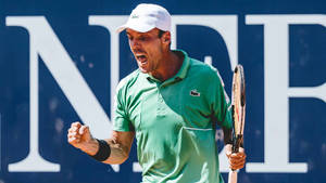 Roberto Bautista Agut In Green Shirt Wallpaper