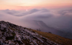 Rocky Hillside On Mountain Top Wallpaper