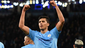 Rodri Raising His Arms Wallpaper