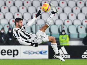 Rodrigo Bentancur Kicking A Ball Wallpaper