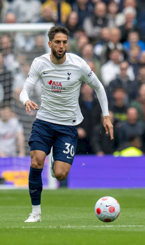 Rodrigo Bentancur Playing Football Full Body Wallpaper