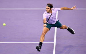 Roger Federer In Purple Court Wallpaper