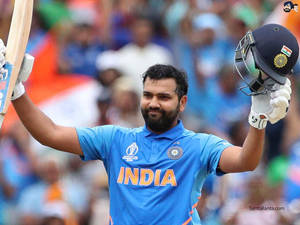 Rohit Sharma Smiling For National Team Wallpaper