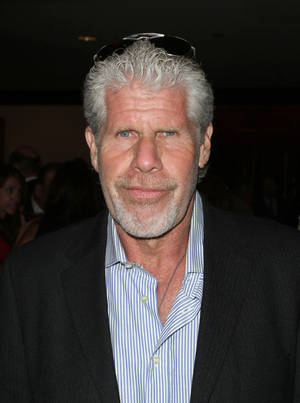 Ron Perlman In Blue Striped Polo Wallpaper