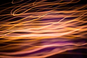 Rose Gold Fire In The Dark Wallpaper