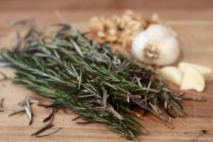 Rosemary And Garlic On Wood Wallpaper