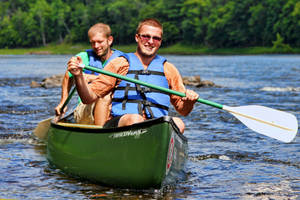 Rowing At Different Side Canoeing Wallpaper