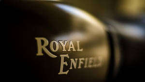 Royal Enfield Hd Brand Name Closeup Wallpaper