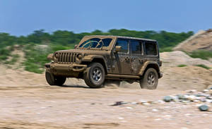 Rugged Adventure Awaits - Black Jeep Wrangler Mudding Wallpaper