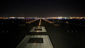 Runway And City Lights Wallpaper