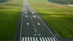 Runway Between The Fields Wallpaper