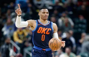 Russell Westbrook Raising One Finger Dribbling Wallpaper