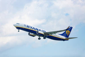 Ryanair Plane Flying In Sky Wallpaper