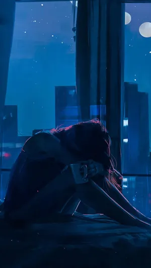 Sad Girl In Bedroom Wallpaper