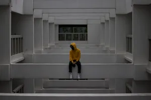 Sad Man Yellow Jacket Wallpaper