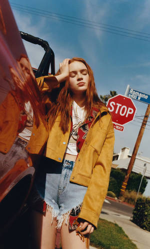 Sadie Sink On A Street Wallpaper