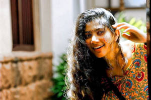 Sai Pallavi Peeping Around Wallpaper