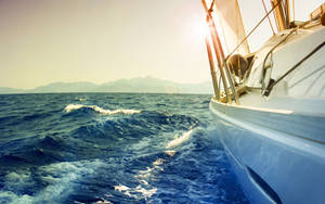 Sailing Leeway On Open Seas Wallpaper