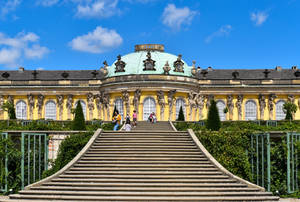 Sanssouci Palace Potsdam With Tourists Wallpaper