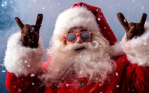 Santa Claus In Rock And Roll Gesture Wallpaper