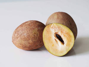 Sapodilla Fruits Grayish Setting Wallpaper