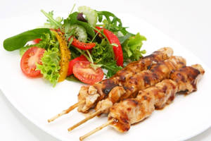 Satay Skewers With Green Salad Wallpaper