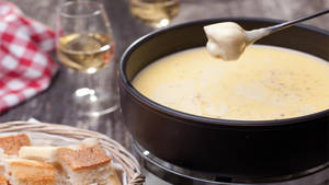 Savory Cheese Fondue Delight Wallpaper