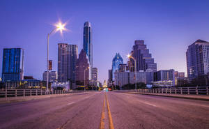 Scenic View Of Congress Bridge In Downtown Austin Wallpaper