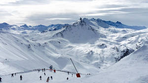 Scenic Winter Ski Slope At Park Wallpaper