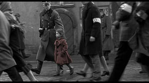 Schindler's List Girl In Red Coat Walking Wallpaper