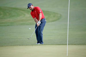 Scott Brown Displaying His Golfing Skillset Wallpaper