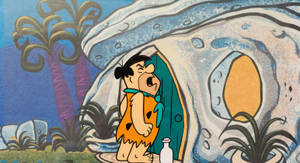 Screaming Fred Flintstone At Front Door Wallpaper