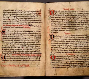 Script Written On Ancient Book Pages Wallpaper