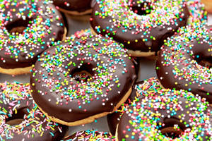 Scrumptious Chocolate Donuts Wallpaper