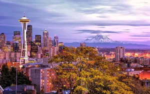 Seattle Skyline At Dusk With Mt Hood In The Background Wallpaper