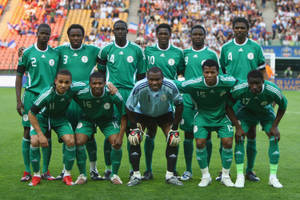 Senegal Football Team In Field Wallpaper