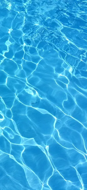 Serene Light Blue Pool Water Wallpaper