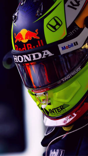 Sergio Perez Geared Up In His Signature Red Bull Helmet Wallpaper